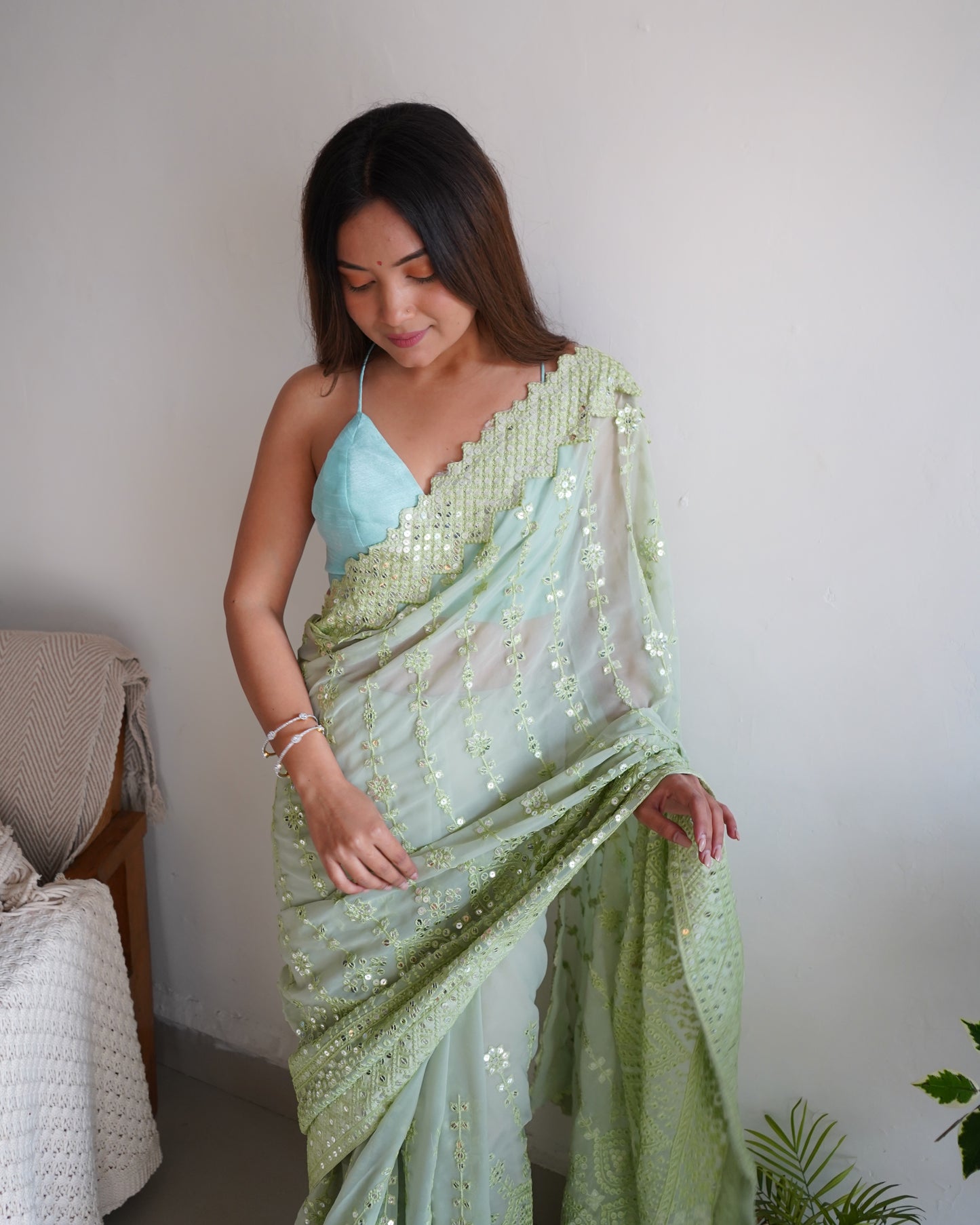 Hand Embroidered Fern-Green Georgette Silk Saree with Chikankari and Sequins work paired with Satin Blouse