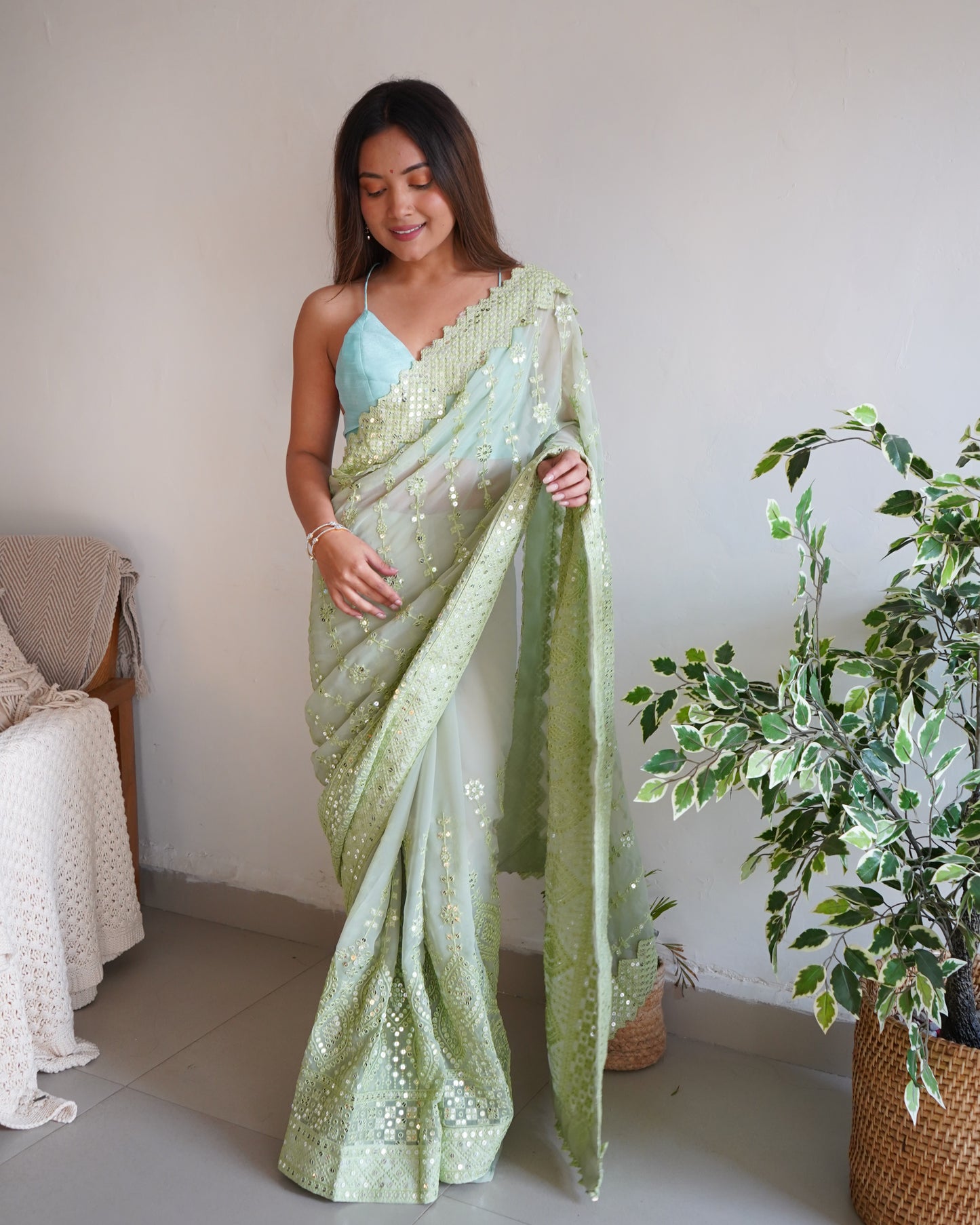 Hand Embroidered Fern-Green Georgette Silk Saree with Chikankari and Sequins work paired with Satin Blouse