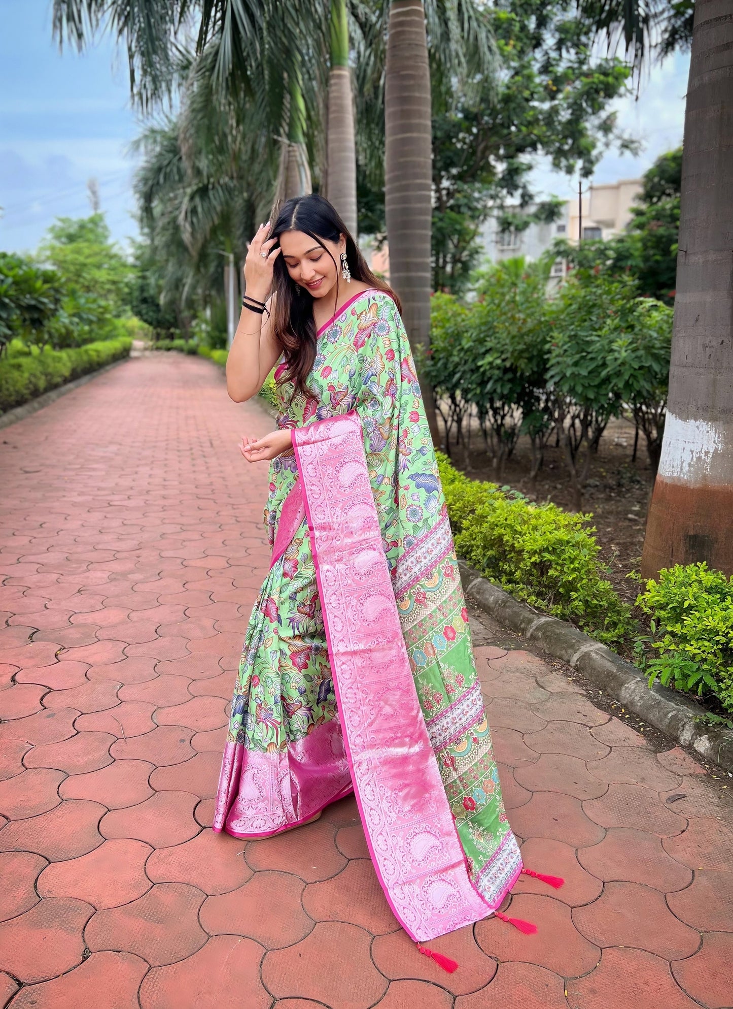 Light-Green Pure Tussar-Dola Silk saree with Rose-Pink contrast Zari Border and Tassels paired with Contrast Blouse