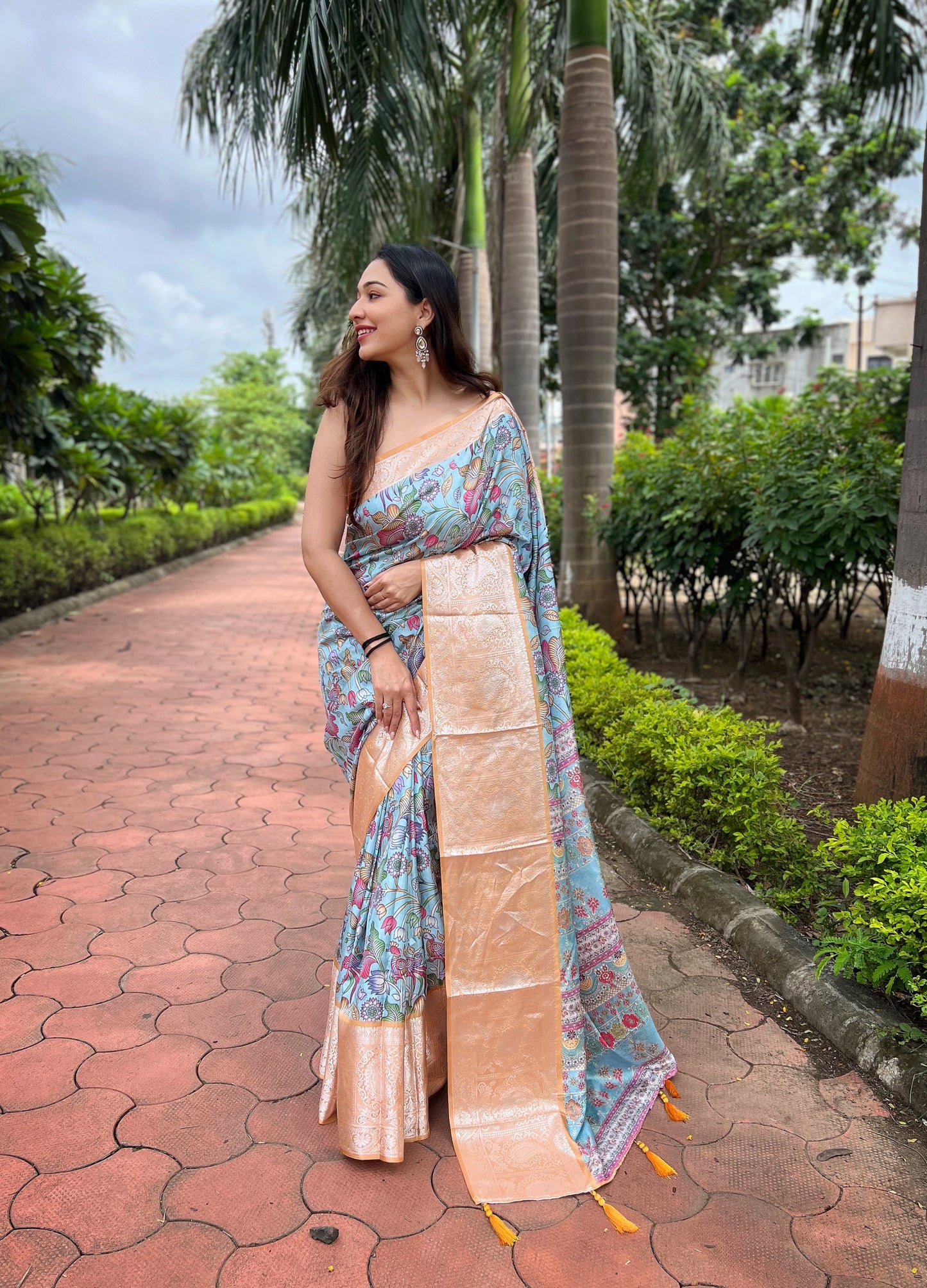 Baby-Blue Pure Tussar-Dola Silk saree with Mustard contrast Zari Border and Tassels paired with Contrast Blouse