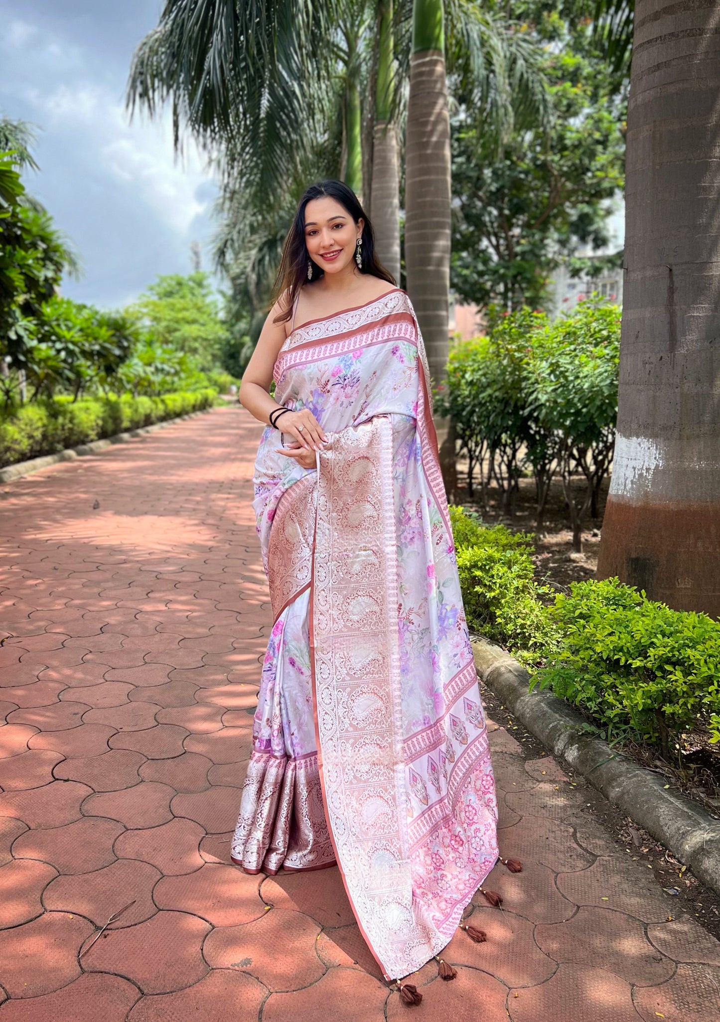 Off-White Pure Tussar-Dola Silk saree with Brown contrast Zari Border and Tassels paired with Contrast Blouse