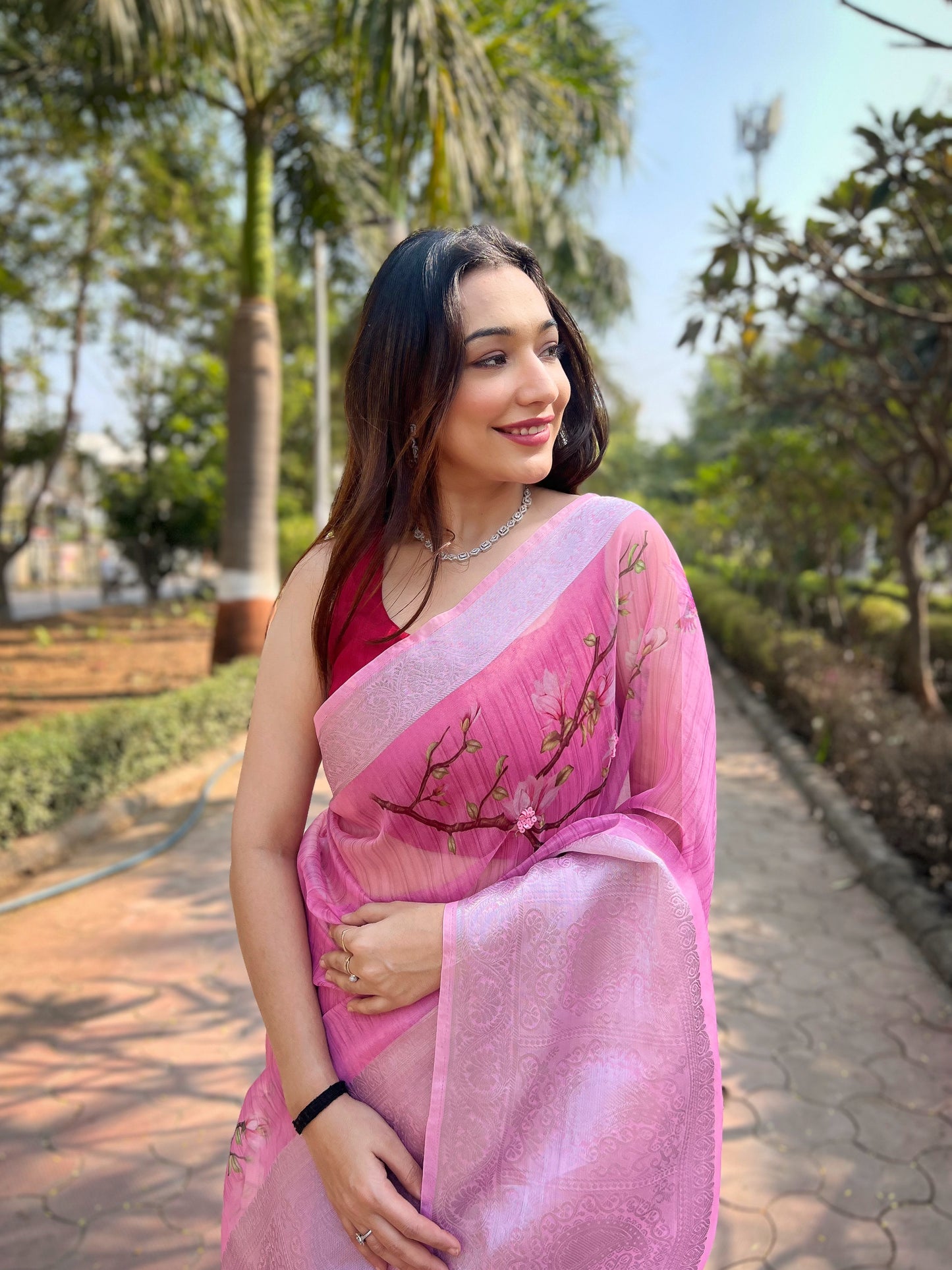 Hand-Woven Soft-Peach Pure Organza Silk Saree featuring a Pure Zari Border, Hand-Painted Designs above the Border, and Delicate Pearl Tassels with Blouse