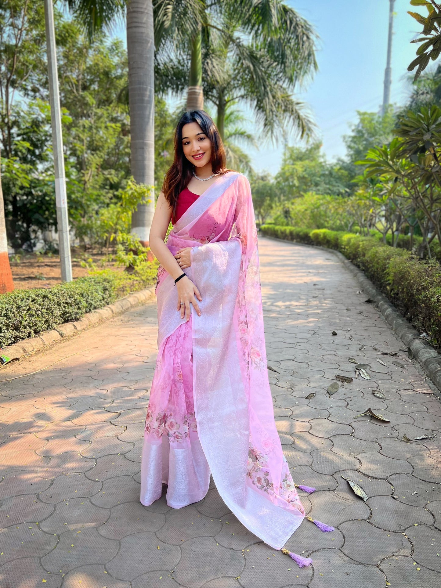 Hand-Woven Fresh-Pink Pure Organza Silk Saree featuring a Pure Zari Border, Hand-Painted Designs above the Border, and Delicate Pearl Tassels with Blouse