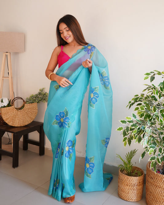 Sky-Blue Pure Organza Cut-Work saree paired with Satin Blouse