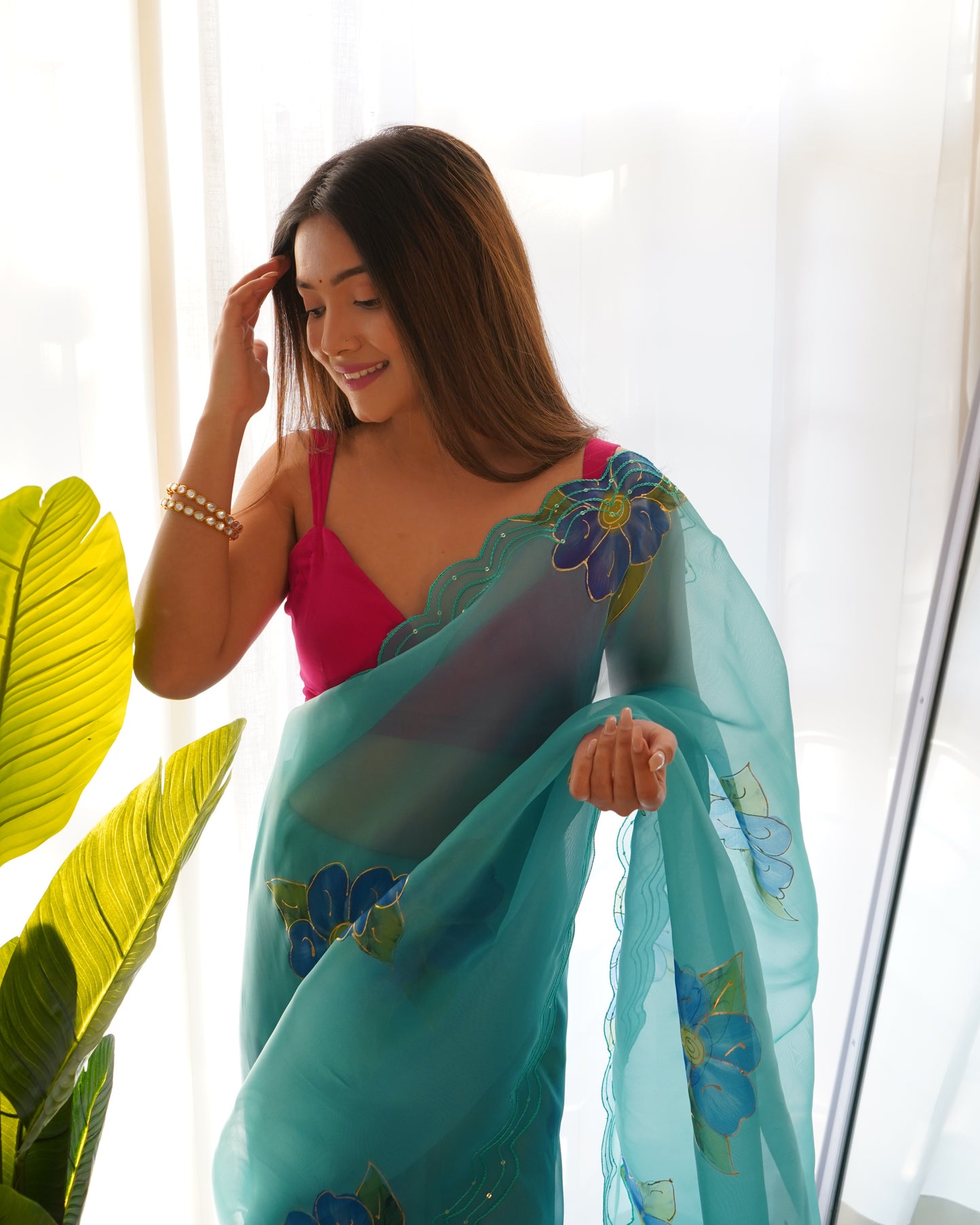 Sky-Blue Pure Organza Cut-Work saree paired with Satin Blouse