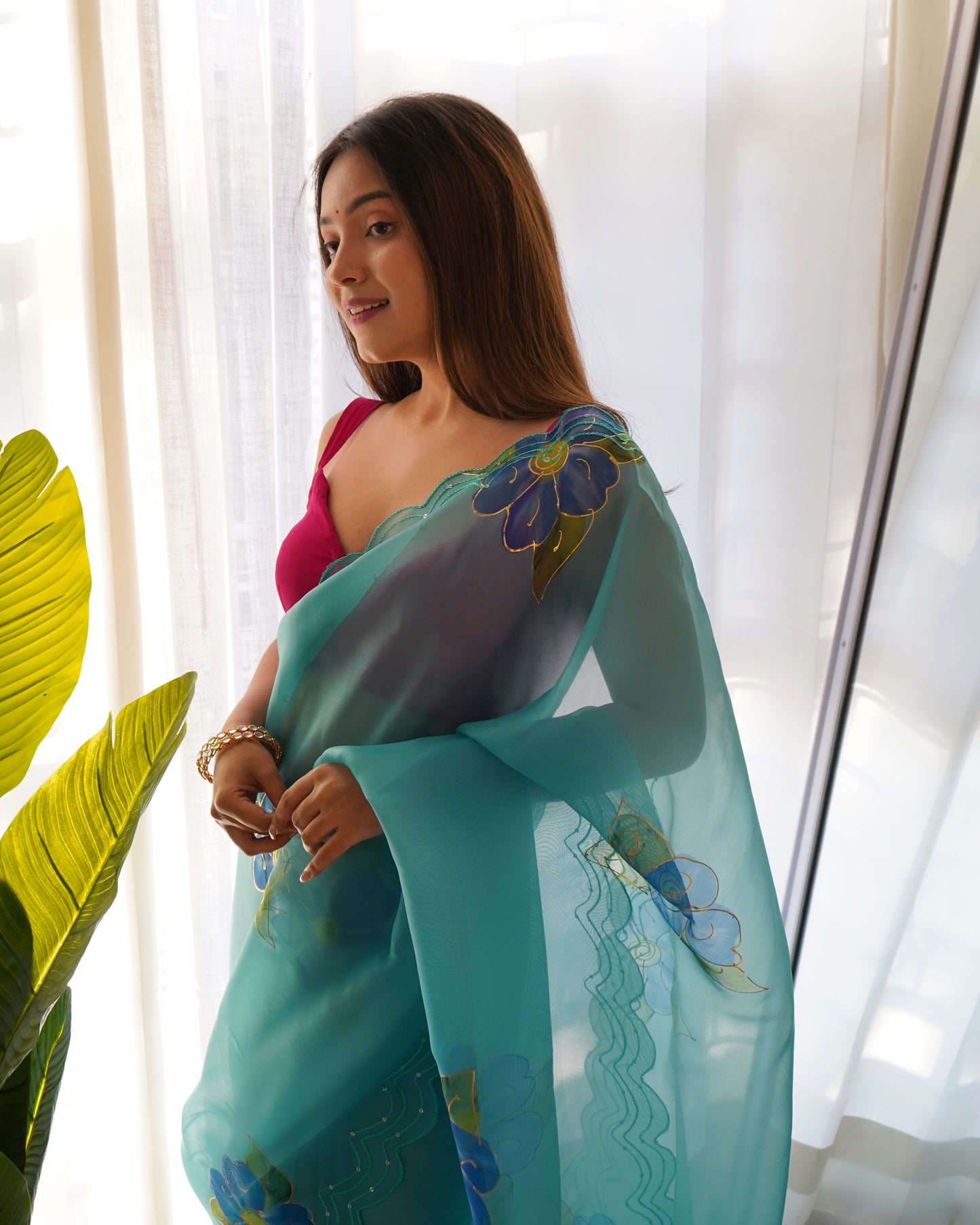 Sky-Blue Pure Organza Cut-Work saree paired with Satin Blouse