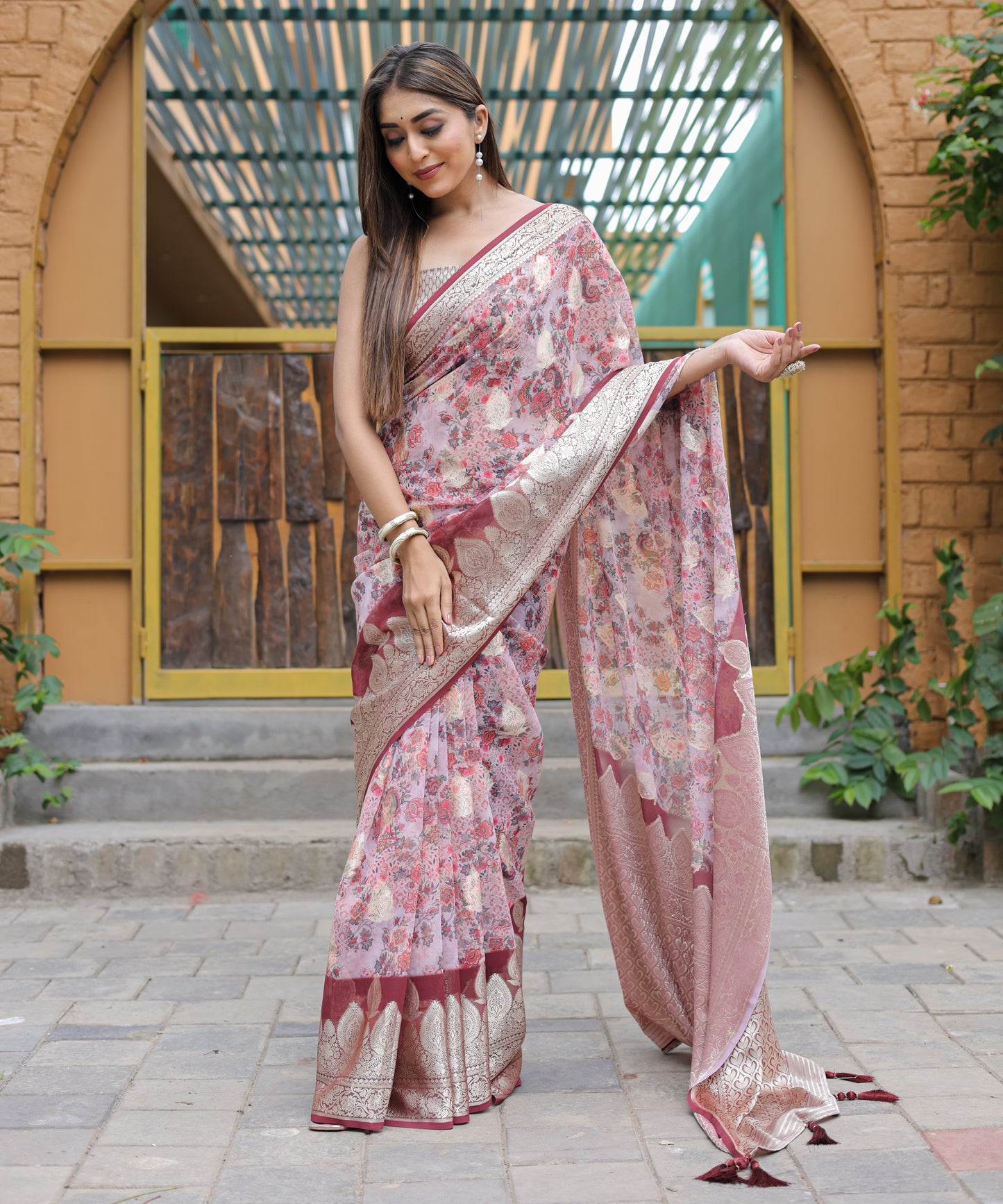 Pure Georgette Salmon-Pink saree in Digital-Print with Maroon Heavy Zari Border and Tassels paired with Blouse