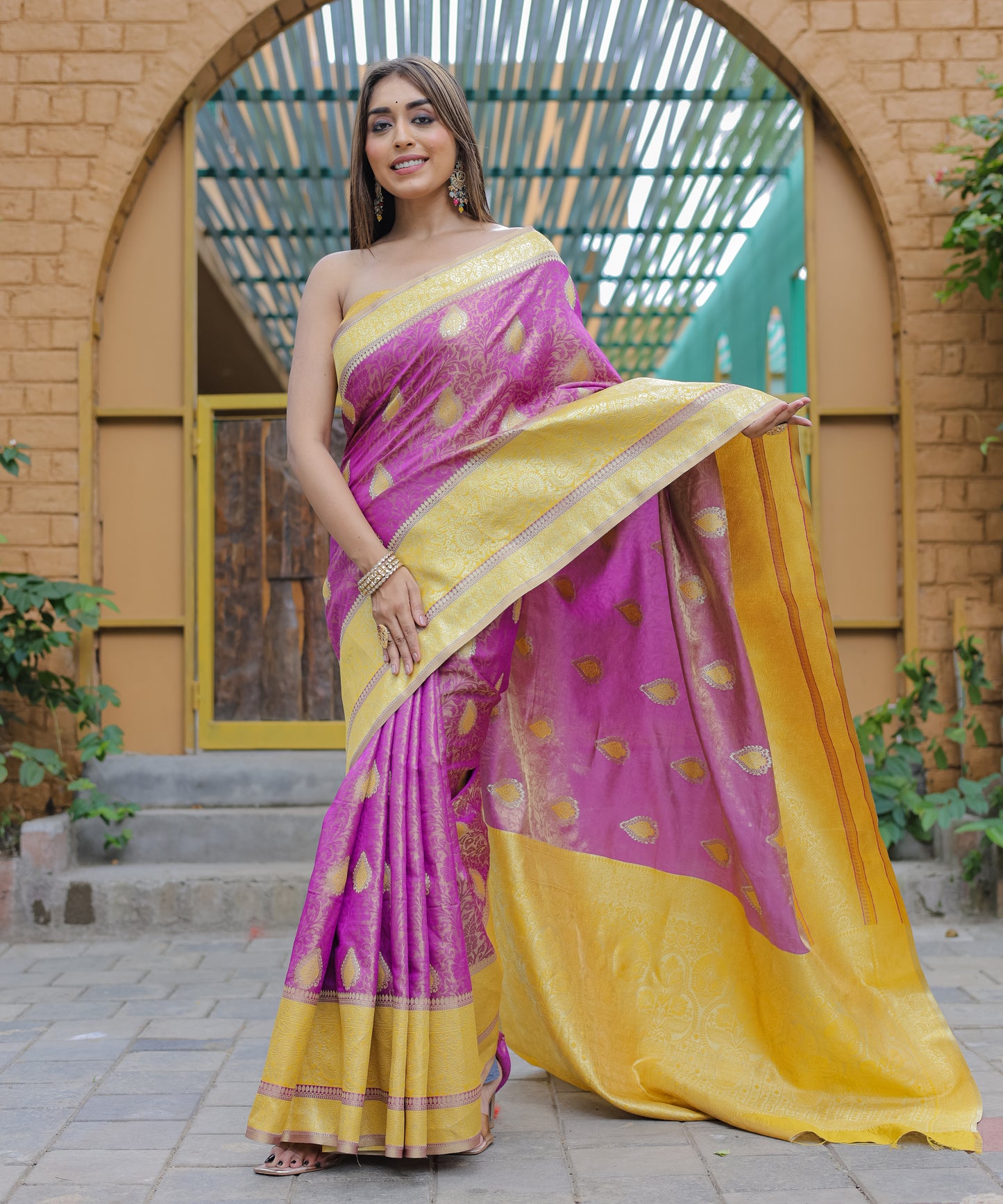 Heavy Embroidered Magenta saree with Sunny-Yellow Zari Border paired with Blouse