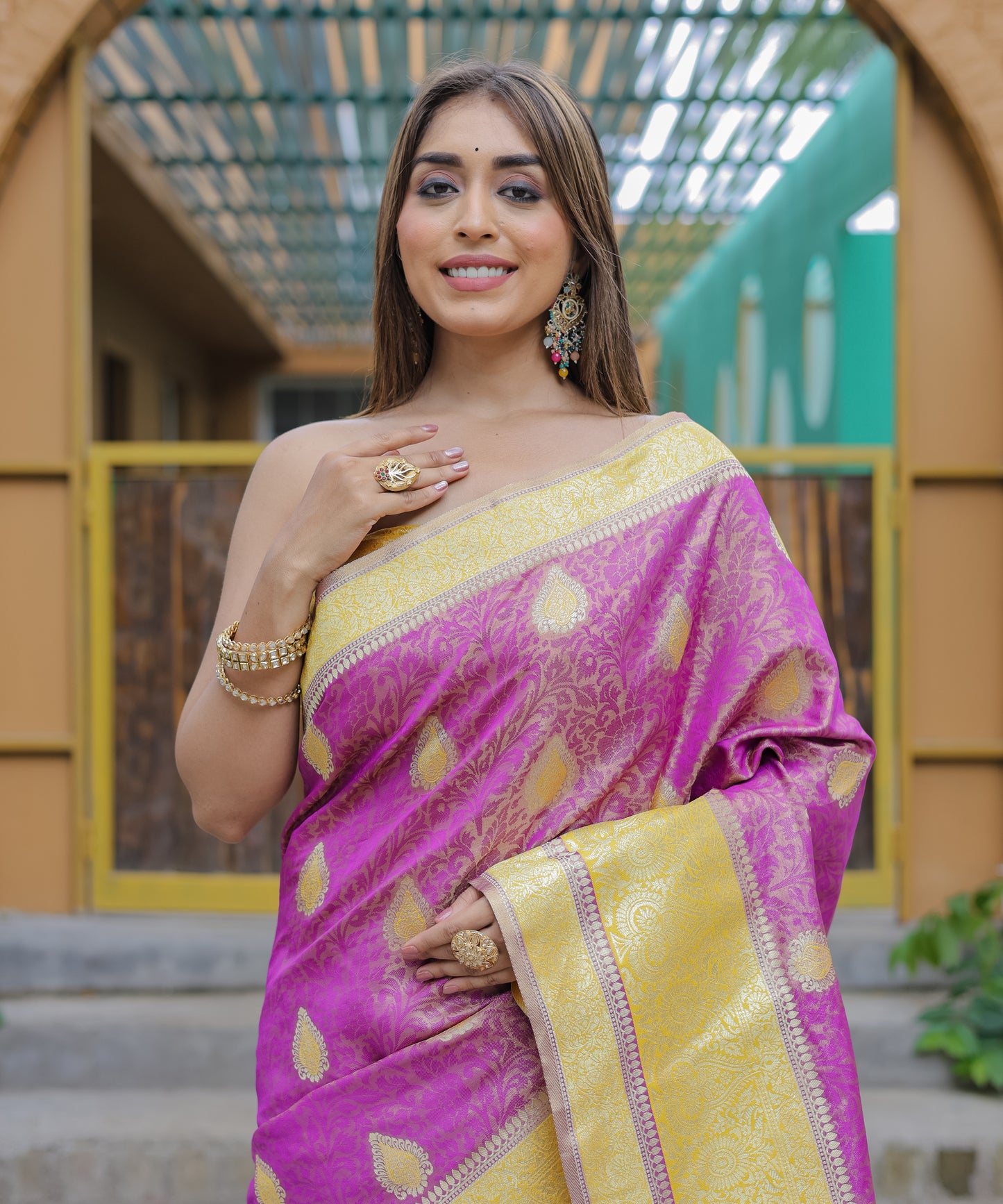 Heavy Embroidered Magenta saree with Sunny-Yellow Zari Border paired with Blouse